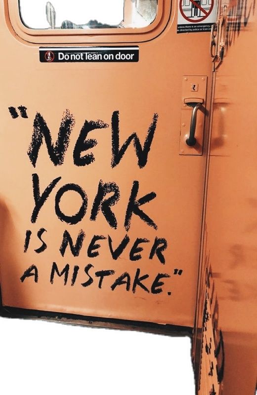 a door with graffiti on it that says new york is never a mistake