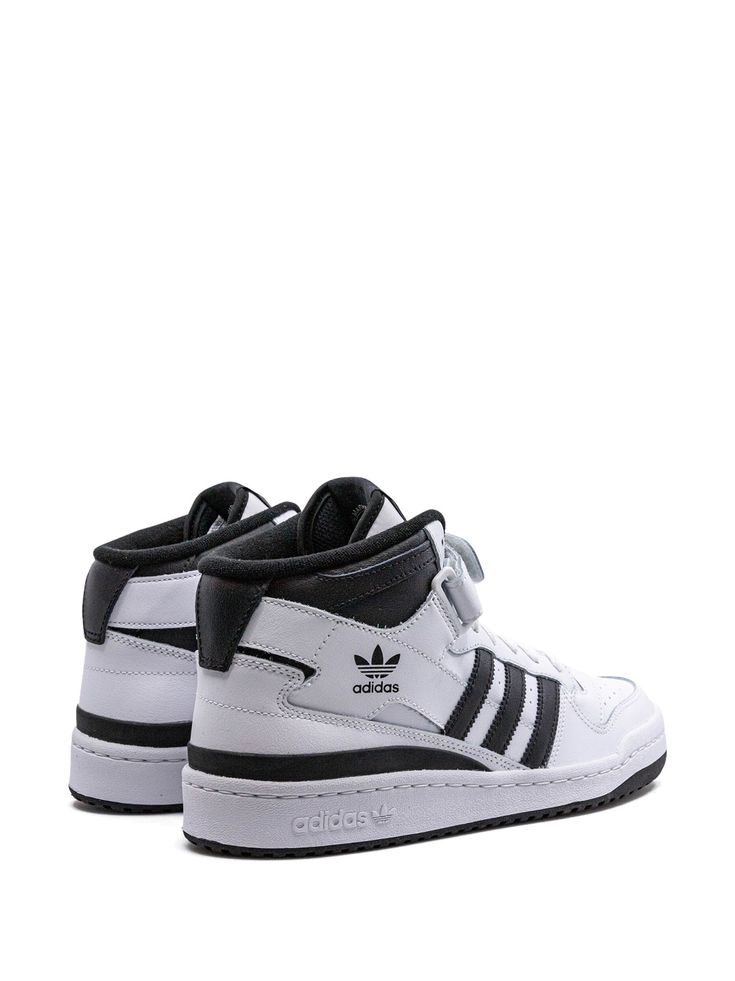 Find ADIDAS Forum Mid Sneakers on Editorialist. black/white calf leather logo print to the side signature 3-Stripes logo round toe front lace-up fastening logo patch at the tongue ankle touch-strap fastening branded insole rubber sole These styles are supplied by a premium sneaker marketplace. Stocking only the most sought-after footwear, they source and curate some of the most hard to find sneakers from around the world. Adidas Sneakers With Three Stripes And White Sole, Adidas High-top Lace-up Sneakers With Three Stripes, Adidas High-top Lace-up Sneakers With Three Stripes Branding, Adidas Lace-up High-top Sneakers With Three Stripes Branding, Classic Adidas Leather High-top Sneakers, Adidas Leather Skate Shoes With Three Stripes, High-top Leather Skate Shoes With Three Stripes Branding, Classic High-top Lace-up Sneakers For Streetwear, Leather Sneakers With Three Stripes For Streetwear