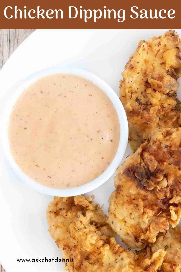 chicken dipping sauce in a white bowl on top of fried food