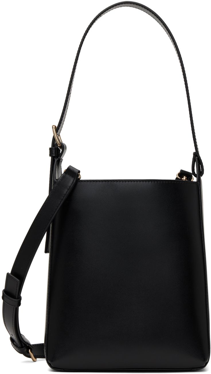 Buffed leather shoulder bag in black. · Adjustable carry handle · Adjustable and detachable crossbody strap · Logo stamp at side · Open throat · Detachable twill pouch at interior · Patch pocket · Gold-tone hardware · H8.25 x W7.25 x D4.5 Supplier color: Black Evening Leather Bucket Bag With Adjustable Handle, Formal Leather Bucket Bag With Adjustable Handle, Formal Bucket Shoulder Bag With Adjustable Handle, Formal Bucket Bag With Adjustable Handle, Business Crossbody Bucket Bag With Detachable Handle, Business Shoulder Bag With Detachable Strap Bucket Shape, Business Bucket Shoulder Bag With Detachable Strap, Black Business Bucket Bag With Detachable Handle, Black Bucket Bag With Detachable Handle For Business