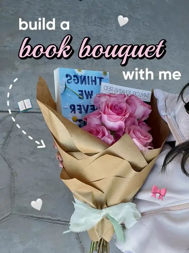 a woman holding a bouquet of pink roses in front of her face with the words build a book bouquet with me