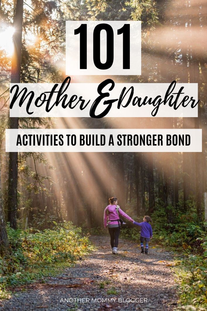 mother and daughter walking down a path in the woods with text overlay reading 101 mother & daughter activities to build a strong bond