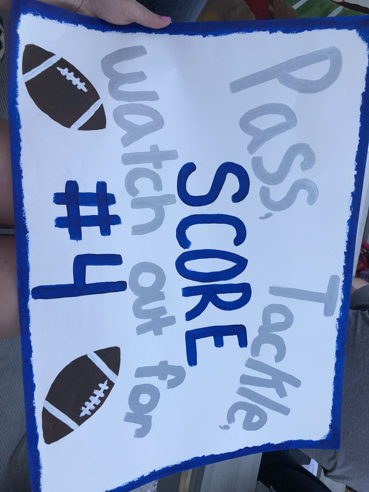 a hand holding up a sign that says it's too late to score football