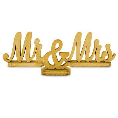 two wooden mr and mrs signs on top of each other, with the word mr and mrs in cursive font