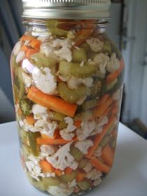 a jar filled with lots of different types of food