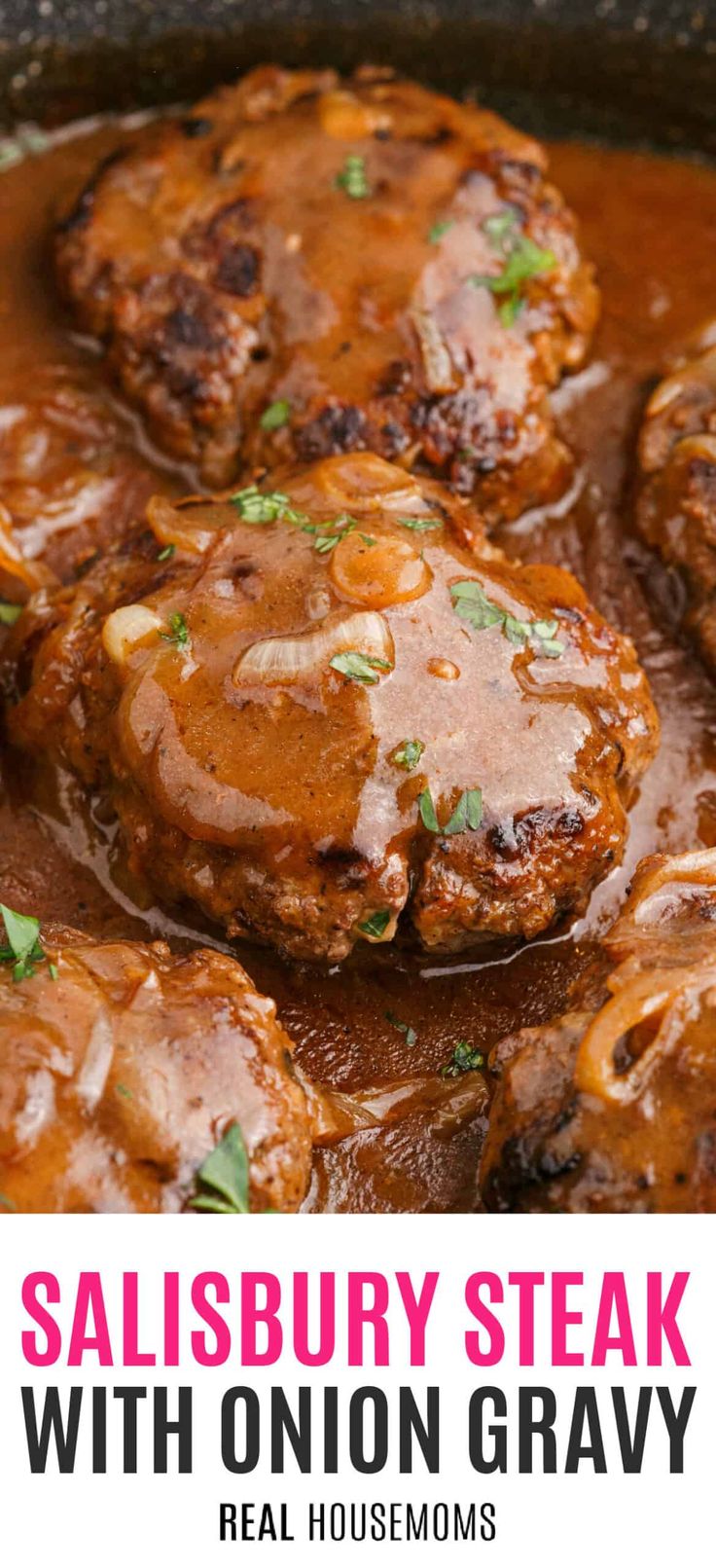 salisbury steak with onion gravy in a cast iron skillet and text overlay