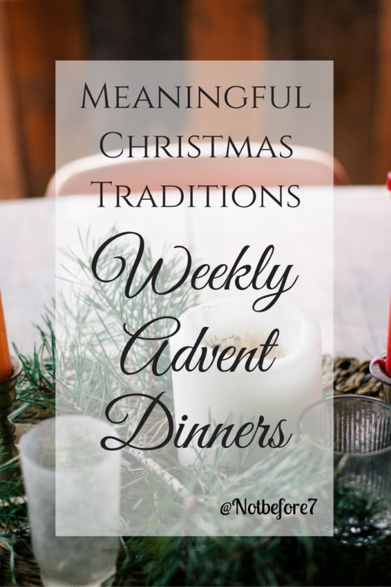 a table topped with candles and christmas decorations