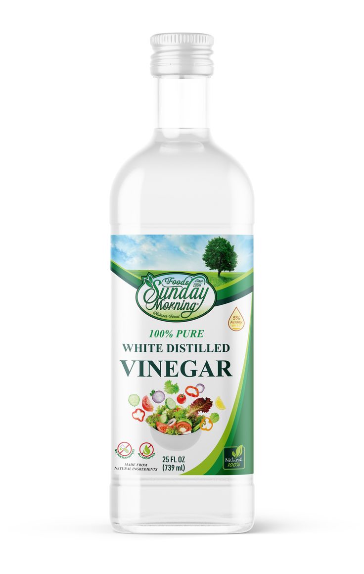 a bottle of vinegar on a white background