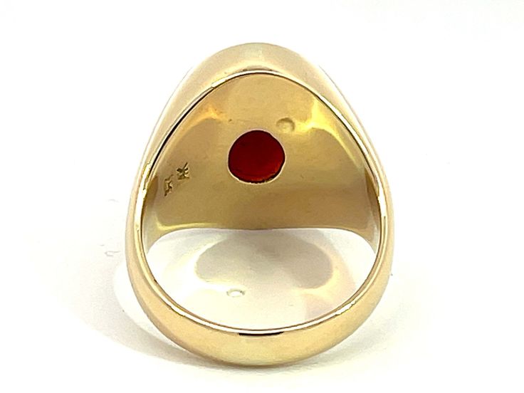 Ring Specifications:Metal: 14k Yellow GoldTotal Weight: 10.7 GramsJade Carat Weight: ~9 caratsJade Measurements: 16.6 mm x 12.8 mm x 4.8 mmRing Size: 8.5 (resizable)Stamped: "14K" "585"Condition: Preowned100% Authentic. Please ask all questions before bidding or making a best offer. International Bidders please contact us before bidding for shipping availability and charges. Yellow Gold Oval Cabochon Ruby Ring, Red Oval Cabochon Ring With Polished Finish, Yellow Gold Carnelian Oval Cabochon Ring, Red Oval Cabochon Gemstone Ring, Luxury Yellow Gold Ruby Ring Oval Cabochon, Jade Ring, Yellow Gold Ring, Oval Cabochon, Red Brown