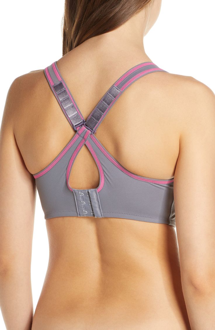 A soft and supportive sports bra is fashioned with wide shoulder straps and a powerful exterior underwire for an exceptionally secure and comfortable fit. Moisture-wicking fabric keeps skin cool and dry. Convertible straps can also be worn crossed in back. Lined. 80% nylon, 20% spandex. Hand wash, line dry. By Wacoal; imported. Lingerie. Nylon Sports Bra With Built-in Padding And Cross Back, Athleisure Nylon Sports Bra With Cross Back, Nylon Racerback Sports Bra With Built-in Bra, Athleisure Sports Bra With Built-in Padding And Wide Straps, Cross-back Nylon Sports Bra With Built-in Bra, Supportive Sports Bra With Built-in Padding, Nylon Sports Bra With Built-in Support For Running, Gray 4-way Stretch Sporty Sports Bra, Sporty Gray Sports Bra With 4-way Stretch