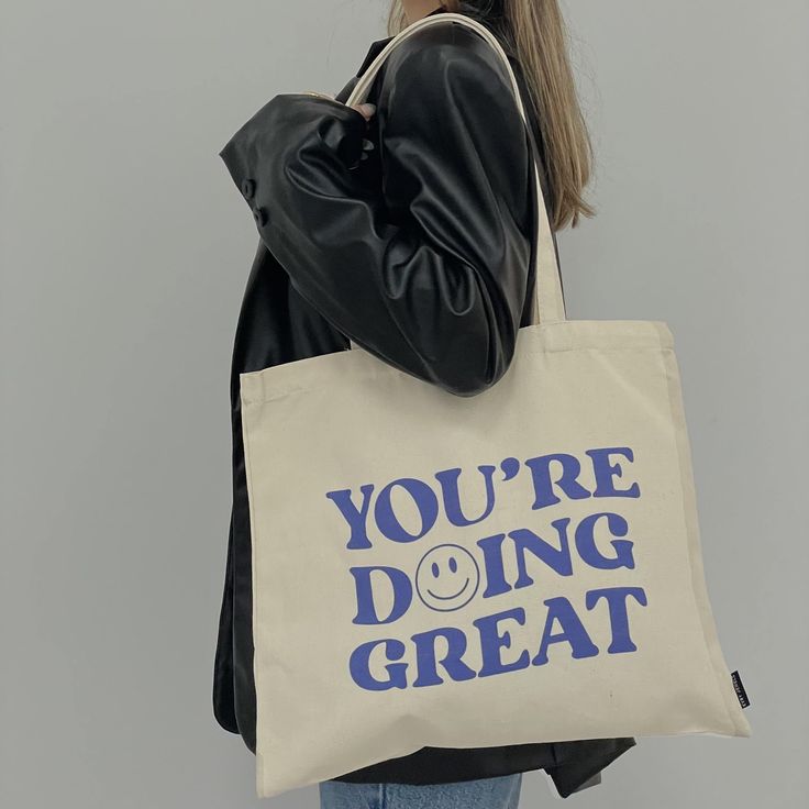 This is your daily reminder! Meet our You’re Doing Great tote bag, the perfect accessory that’s guaranteed to complete your everyday outfit. Get this stunning baby before it’s too late! You're Doing Great, Quote Tote Bag, Bag Quotes, Trendy Tote Bags, Diy Tote Bag, Cute Tote Bags, Everyday Outfit, Cool Socks, Printed Tote Bags