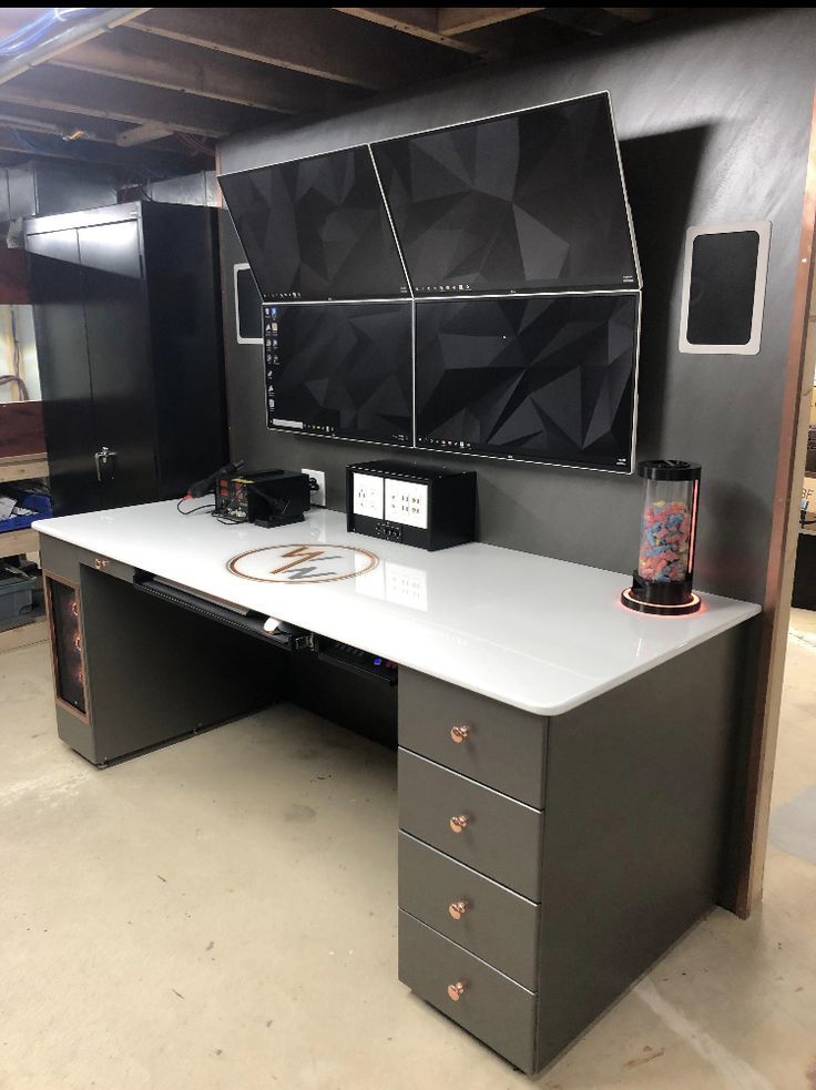 an office desk with black and white decor