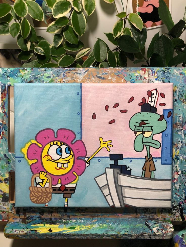 a painting of a cartoon character on a painted bench next to a potted plant