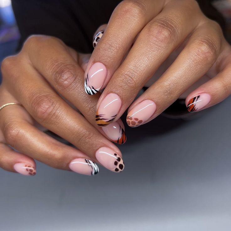 Animal print frenchies 🦓 On a short almond with all neutral tones 🤎 #nailart #naturalnails #naturallongnails #gelnails #bayareanails #groovynails #nailinspo Short Almond Cheetah Nails, Animal Print Tip Nails, Zebra Nail Art Designs, Animal Print French Nails, Short Animal Print Nails, Short Leopard Print Nails, Safari Themed Nails, Safari Theme Nails, Animal Print French Tip Nails