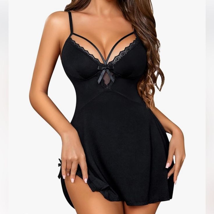 This Babydoll Nightgown Is Made Of High-Quality Lace And Modal, Ensuring A Smooth, Stretchy, And Lightweight Feel That Is Incredibly Comfortable To Wear At Night. The Soft And Breathable Fabric Adds To Its Charm And Sexiness, Providing A Comfortable Wearing Experience. Featuring A Deep V-Neck Lace Design, This Babydoll Nightgown Fits Perfectly On Your Chest And Accentuates Your Charming Breast Curve. It Is A Must-Have Suspender Underwear That Adds Allure To Your Wardrobe. The Flowy Bottom With E Black Flirty Loungewear Sleepwear, Black Flirty Sleepwear, Flirty Black Sleepwear, Flirty Black Sleepwear For Night, Coquette Black Nightgown For Sleep, Black Coquette Nightgown For Sleep, Black Coquette Sleepwear For Wedding Night, Black Coquette Nightgown For Bedtime, Black Camisole Nightgown For Wedding Night