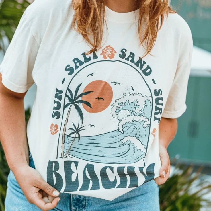 Beachy Tee | Shop Mountain Moverz T-Shirts Cream Cotton T-shirt With Graphic Print, White Print T-shirt For Summer, Beige Graphic Print Shirt For Summer, Beige Shirt With Graphic Print For Summer, Beige Crew Neck T-shirt With Screen Print, Cream Screen Print Crew Neck T-shirt, Casual Off White Graphic Print Tops, Casual Off-white Graphic Print Top, Casual Off White Tops With Graphic Print