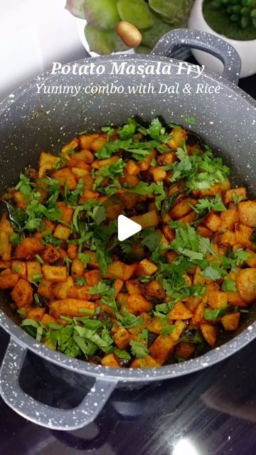 a pan filled with food sitting on top of a stove