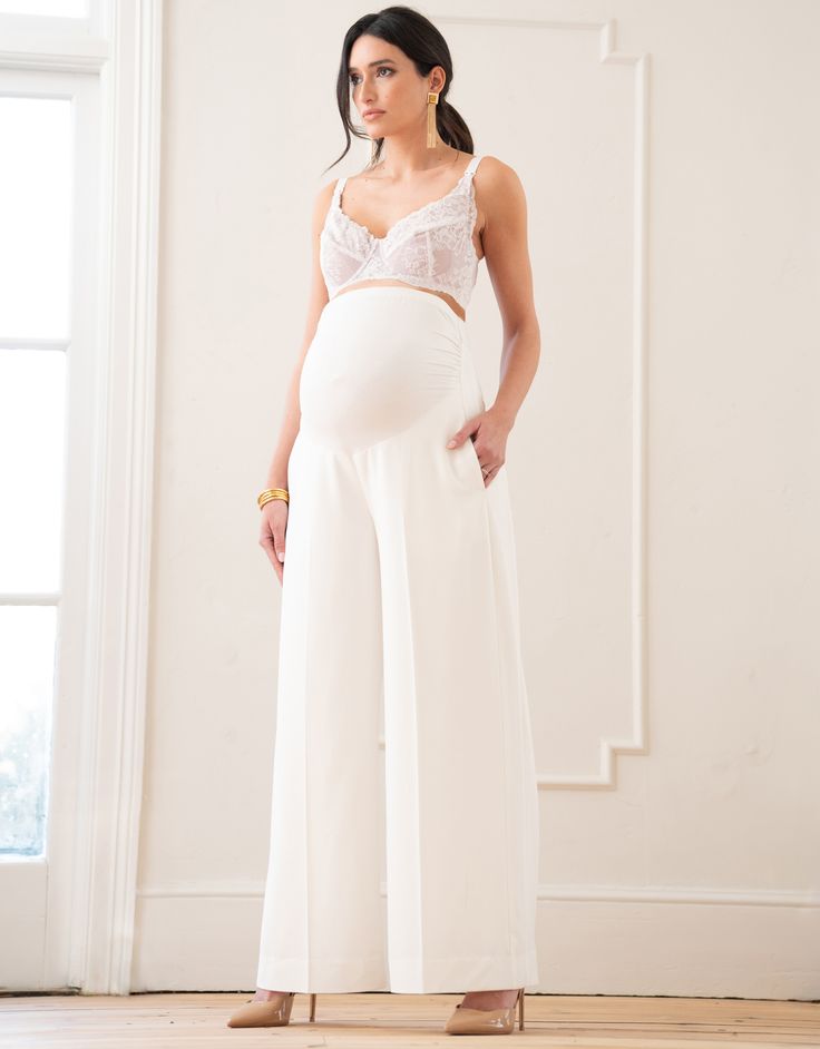 Featuring a strong and elegant silhouette, Seraphine's wide-leg over bump pants in an ivory colourway offer an ideal option for the bride who's looking for something a little different on her wedding day. Baby Wearing Coat, Maternity Dress Outfits, Maternity Brands, Baby Shower Outfit, Occasion Dresses Wedding, Baby Shower Dresses, Shower Dresses, Looking For Something, Nursing Clothes