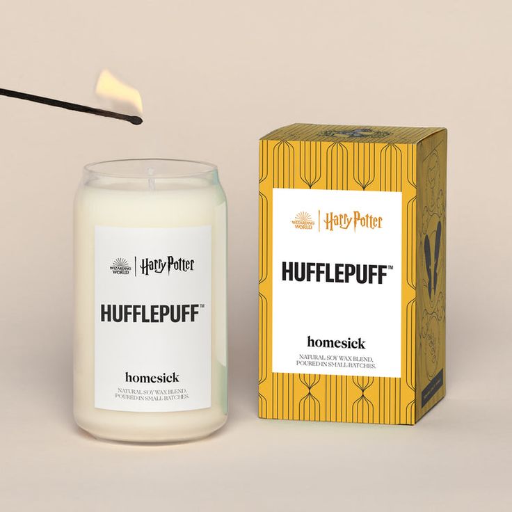 a candle that is next to a box