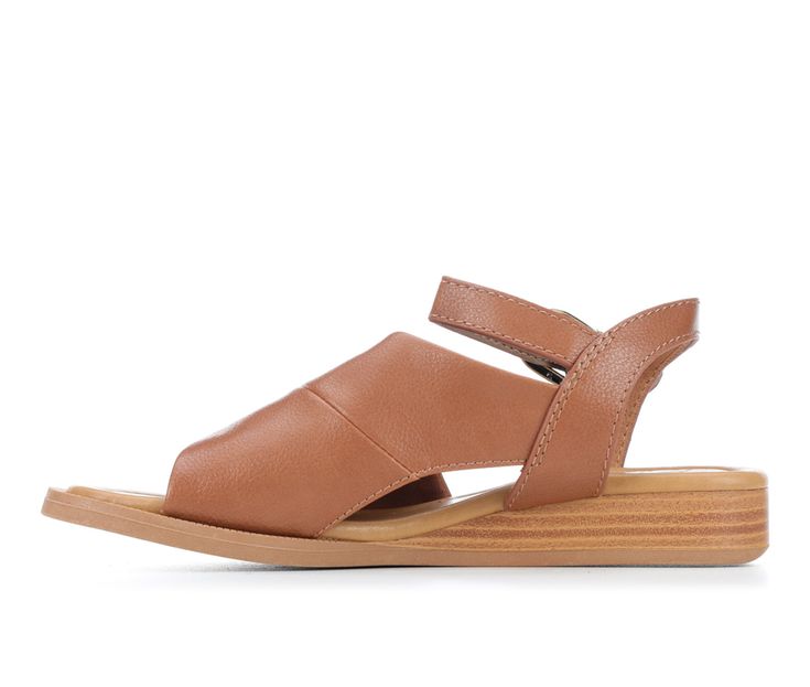 Step into laid-back elegance with the Blowfish Malibu Ardice Wedges. The comfortable wedge heel provides just the right amount of lift for a flattering silhouette, while the adjustable strap design ensures a personalized fit. Whether you're strolling along the boardwalk or enjoying brunch with friends, the Ardice Wedges effortlessly combine style and ease. Open toe, Adjustable ankle strap closure for a custom and secure fit, Lightly padded footbed, Smooth synthetic lining, Durable texture outsol Brown Leather Slip-on Wedge Sandals, Adjustable Slip-on Synthetic Wedge Sandals, Adjustable Brown Slip-on Wedge Sandals, Beach Slip-on Wedge Sandals With Buckle Closure, Comfortable Wedges, Brown Synthetic Wedge Sandals With 4-inch Heel, Flat Sandals, Wedge Heels, Wedge Sandals