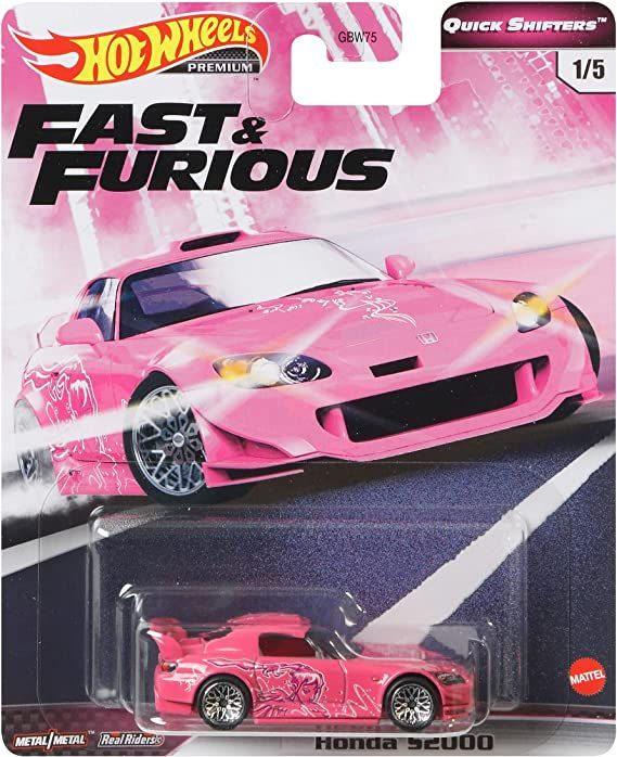 the hot wheels fast and fabulous pink car is shown in front of a white background