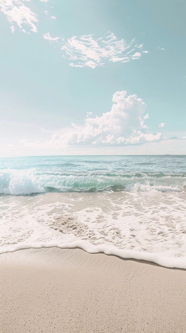 an ocean view with waves crashing on the beach and clouds in the sky over the water