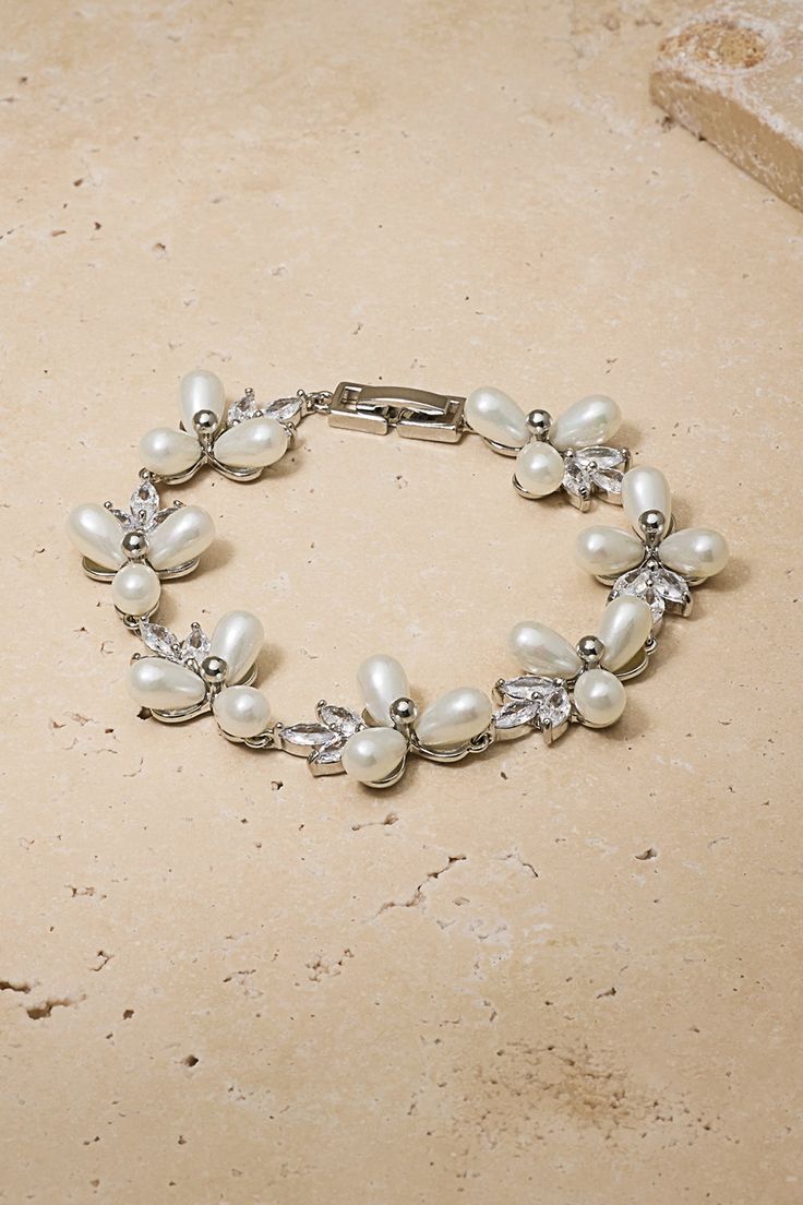 This stunning bracelets combines sparkling crystals with the luster of pearls to elevate your look and add the perfect touch of elegance. Cute Packaging, Sparkling Crystal, Elevate Your Look, Base Metal, Bridesmaid Gifts, Gold Bracelet, Sparkle, Bracelet, Crystals