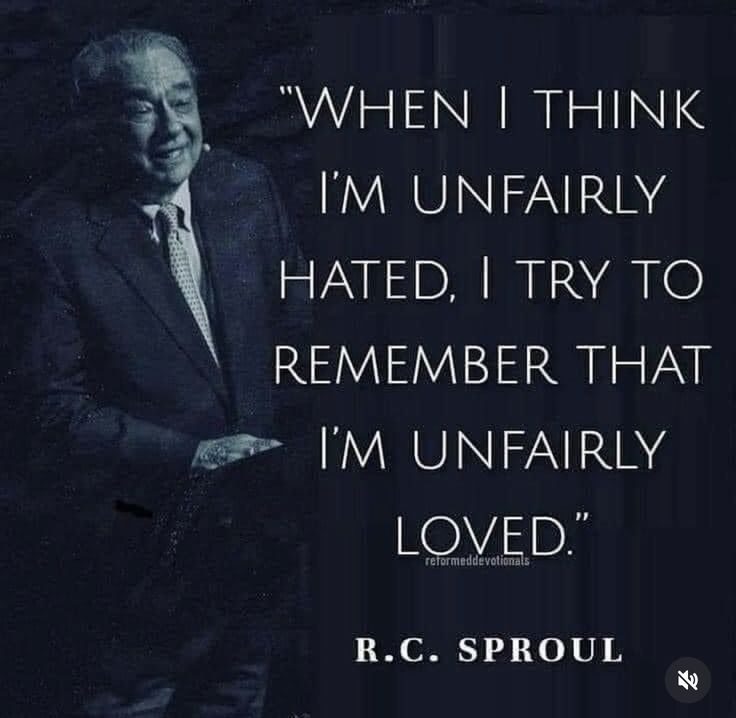 a man in a suit and tie with a quote from r c sproul