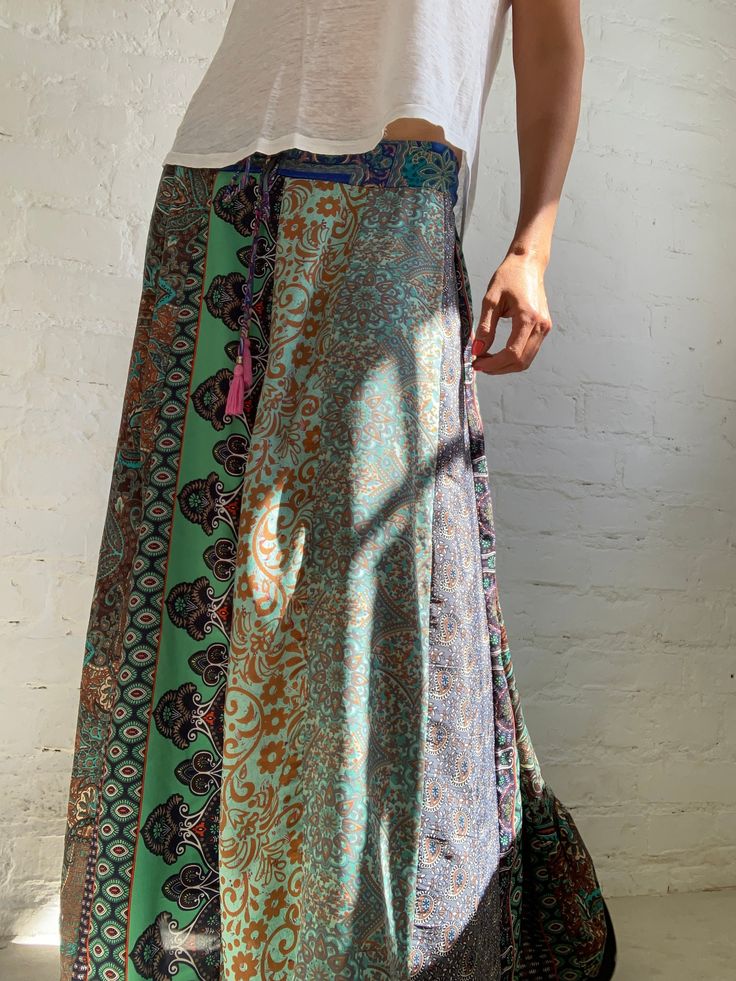 "This is oryginal patchwork design skirt long and flowy, upcycled from silky saree material very colourful with different patterns  always one of a kind  perfect for everyday or summer parties and festivals  MEAESURE stretchy waist 30-36\" length 37\" MATERIAL *polyester  * no lining More boho style ideas at  https://www.etsy.com/shop/AltheaStores CARE INSTRUCTIONS  * Wash in warm water * Hand wash recommended * Hang to dry  IMPORTANT NOTE  * Please note that colour shown on your monitor may var Silky Saree, Long Boho Skirt, Saree Material, Long Flowy Skirt, Design Skirt, Chic Skirt, Boho Skirt, Chic Skirts, Boho Skirts