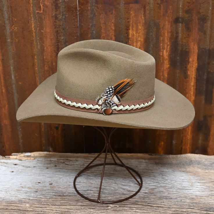 Hit the trails in style with the Charlie 1 Horse Road Runner in Pecan! This western-inspired hat is perfect for the adventurous soul and adds a touch of rustic charm to any outfit. With high-quality materials and expert craftsmanship, this hat will keep you looking and feeling great as you blaze your own trail. Additional Information: PLU: HTC-CWRDRN-4232F5 Brand: CHARLIE 1 HORSE Southwestern Wide Brim Felt Hat For Western-themed Events, Rustic Outdoor Hats For Fall, Rustic Hat For Fall Country Events, Bohemian Brown Hat For Outdoor, Rustic Wide Brim Hat, Rustic Adjustable Felt Hat For Kentucky Derby, Rustic Fedora Hat, Rustic Ranch Hat With Short Brim, Rustic Flat Brim Hat For Rodeo