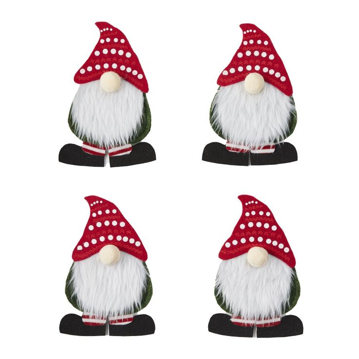 four gnomes with red and white hats on their heads, one is wearing a polka dot hat