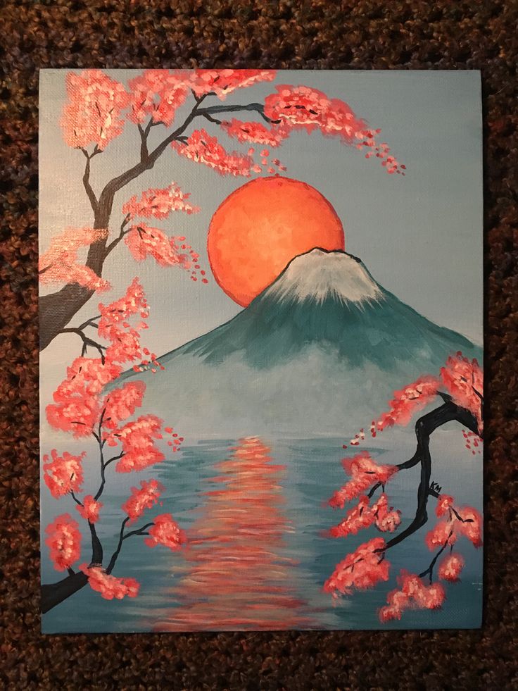 a painting of a cherry blossom tree in front of a mountain with the sun setting