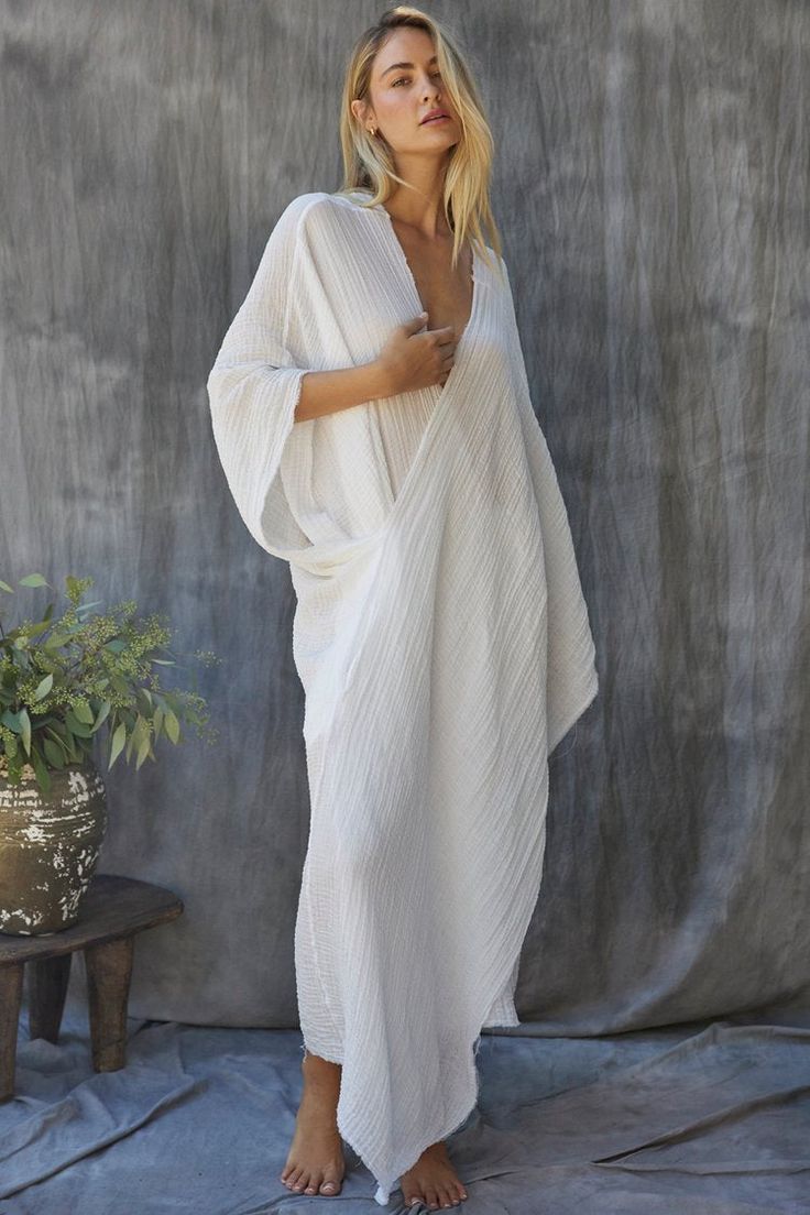 9SEED | QUITANA WRAP AROUND CAFTAN | WHITE White V-neck Kaftan For Spring, Chic White Kimono For Beach Cover-up, White V-neck Kimono For Daywear, White Long Kimono For Loungewear, Chic White Kimono For Loungewear, White V-neck Kimono For Vacation, White Kaftan For Loungewear, White Wrap Kaftan For Summer, White Long Sleeve Kaftan For Daywear