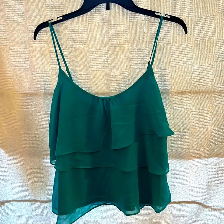 Teal Layered Flowy Top Adorable And Goes With A Lot Of Diff Things! Brand New Never Worn Tags Attached And In Photos. Adjustable Straps Green Cami Top For Day Out, Layered Sleeveless Top For Summer, Layered Sleeveless Tops, Chic Green Cami Blouse, Chic Green Tops With Spaghetti Straps, Chic Green Spaghetti Strap Tops, Green Chic Camisole For Day Out, Chic Green Camisole For Day Out, Green Ruffled Cami Top