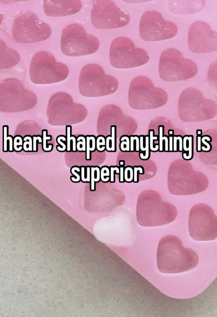 a pink heart shaped ice tray with hearts on it and the words, i'm not