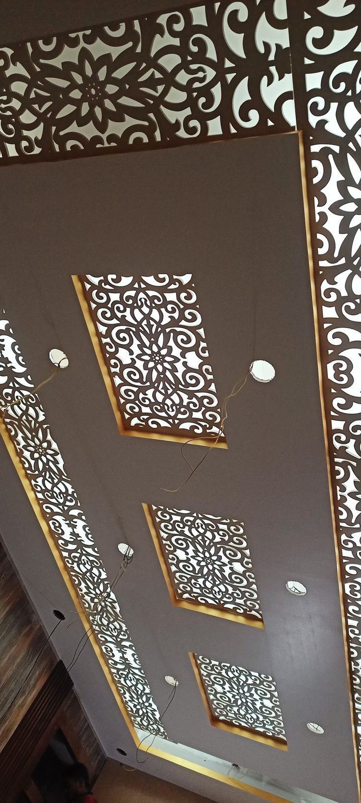 the ceiling is decorated with intricate designs