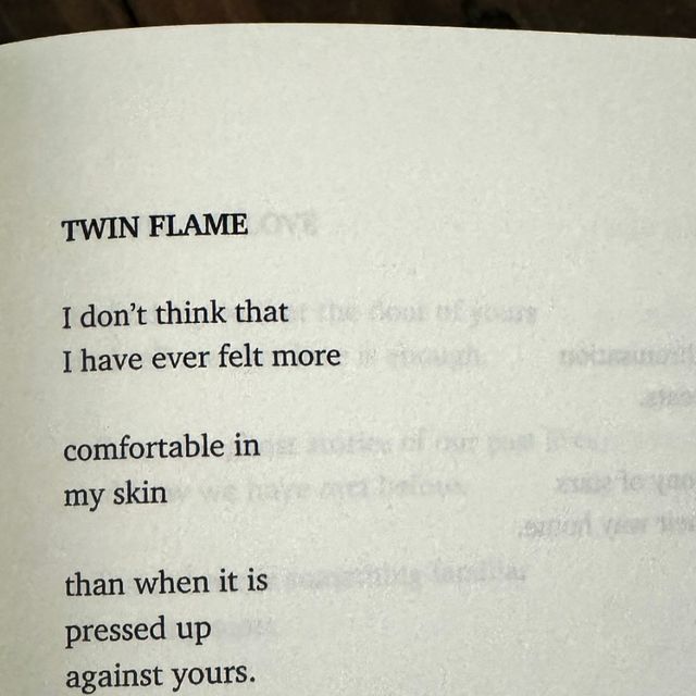 an open book with the words twin flame written in black on it's page