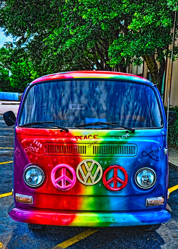 a van with peace signs painted on it