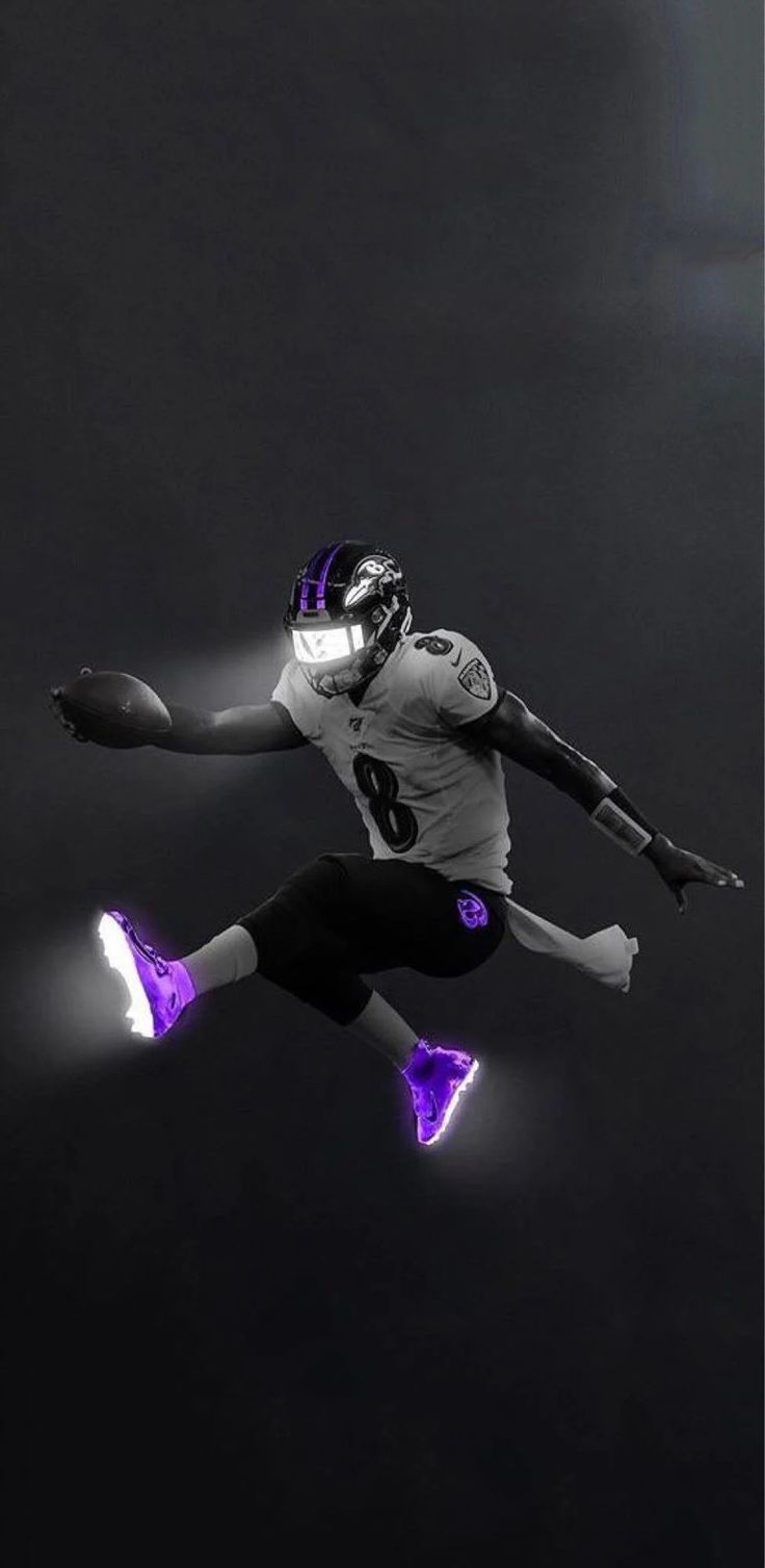 a football player is jumping in the air