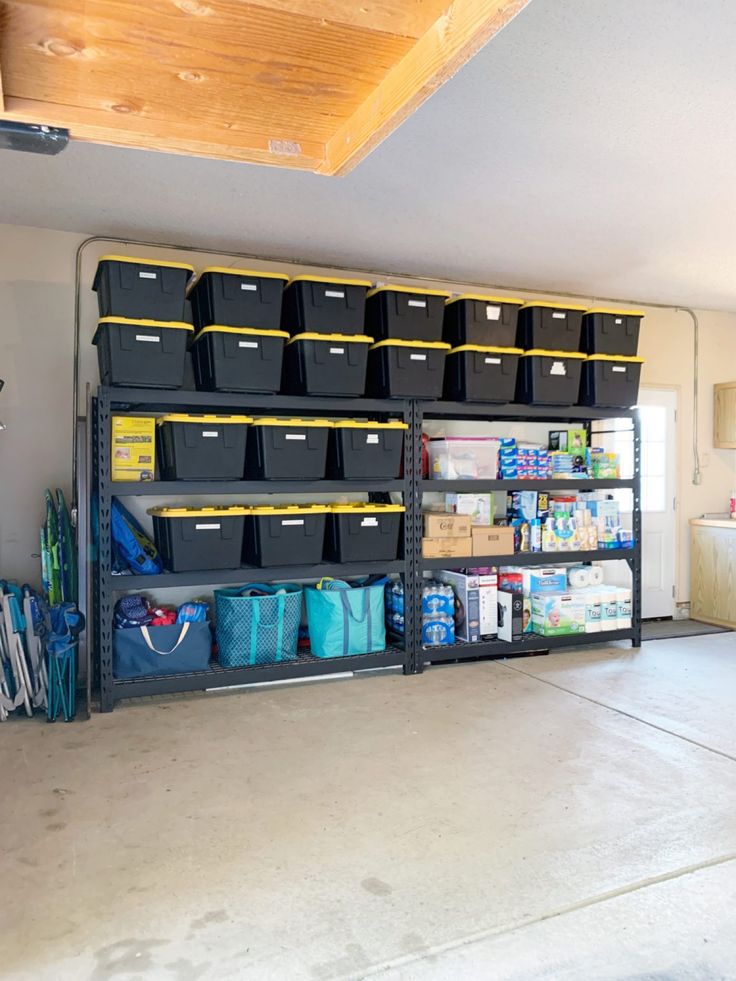 a garage filled with lots of storage bins