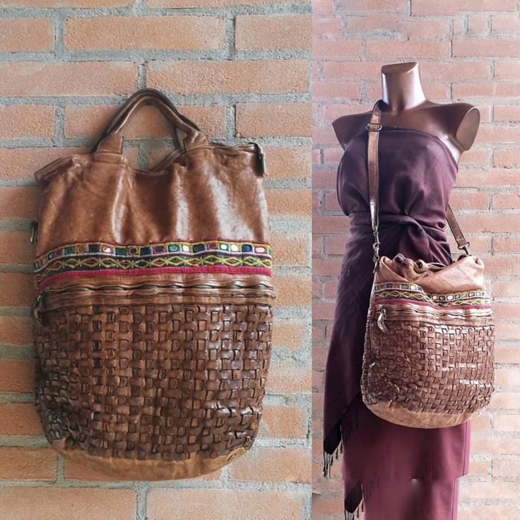 "Very large bag, with short handles and shoulder strap, in tobacco color tanned leather. Half of the bag is  made of hand-woven leather, with a large zipped pocket on the front.  The interior is lined in cotton and has three internal leather pockets. The Banjara decor was formerly a part of an embroidered cotton dress: the shape of the mirrors recalls the particular weaving of the leather. This is an stunning bag! An uotstanding piece that talks about your love for travel and the East. o Italian vegetable tanned leather o Large zippered pocket on the front. o Short leather handles o Adjustable and detachable shoulder strap o Zip closure on the top o Cotton lining o Internal zippered pocket and two smaller leather pockets  o Banjara embroidery decor on the front of the bag MEASUREMENTS Heig Brown Leather Hobo Bag With Woven Details, Leather Handwoven Shoulder Bag, Brown Woven Leather Shoulder Bag With Double Handle, Brown Top Handle Shoulder Bag In Woven Leather, Traditional Woven Leather Shoulder Bag For Daily Use, Brown Woven Leather Hobo Tote Bag, Brown Woven Leather Hobo Shoulder Bag, Brown Woven Leather Hobo Bag, Brown Woven Leather Shoulder Bag