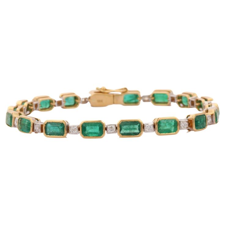 This Emerald and Diamond Tennis Bracelet in 18K gold showcases 18 endlessly sparkling natural emerald, weighing 10.25 carats and 18 pieces of diamonds weighing 0.78 carats. It measures 7 inches long in length. Emerald enhances the intellectual capacity of the person. Designed with perfect octagon cut emerald set horizontally in bezel setting with diamond after each emerald to make you stand out on any occasion or event. The elegant style complements the attire beautifully and this is a perfect U Bracelet Tennis, Emerald Bracelet, Mother Daughter Gifts, Classic Bracelets, Diamond Tennis Bracelet, White Gold Bracelet, Sapphire Bracelet, Tennis Bracelet Diamond, Gemstone Bracelets