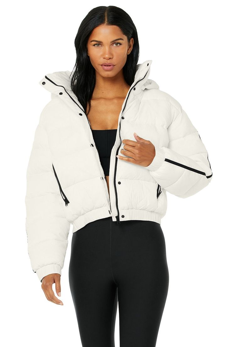 Your new outerwear obsession: the Aspen Love Puffer Jacket. Crafted with high-tech ripstop fabric, this regular-length puffer locks in warmth during cold weather months. Snap front buttons and side zip pockets keep this jacket on-trend while the removeable hood lets you adjust your cozy look as desired. Street-ready, water-resistant ripstop Designed & uniquely fit to flatter every size Wear-tested by our in-house team for the perfect fit Alo Yoga® | Aspen Love Puffer Jacket in Ivory, Size: L Yoga Jacket, White Puffer, Ripstop Fabric, Athleisure Wear, Snowboard Jacket, Back Women, Alo Yoga, Yoga Clothes, Aspen