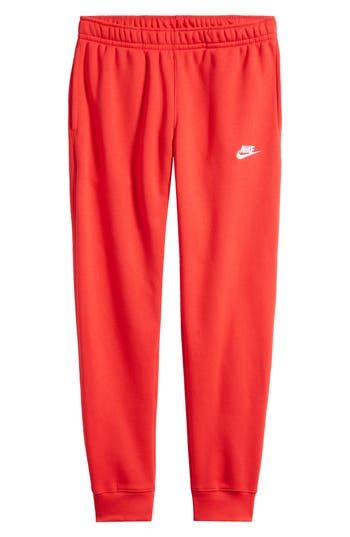 An embroidered Swoosh marks the pocket of these sweatpants made for comfort from fleece with a sporty fit that slims at the ankle. 28 1/2" inseam; 10" leg opening; 12 1/2" front rise; 16 1/2" back rise (size Medium) Elastic/drawstring waist Side-seam pockets; back welt pocket Cotton/polyester Machine wash, tumble dry Imported Nike Cotton Sweats For Jogging, Nike Leisure Sweatpants With Comfort Waistband, Nike Sweatpants With Comfort Waistband For Leisure, Nike Joggers With Ribbed Waistband For Jogging, Nike Leisure Joggers With Ribbed Waistband, Nike Sweatpants With Ribbed Cuffs For Jogging, Nike Casual Sweatpants For Loungewear, Nike Casual Joggers For Leisure, Nike Sweatpants With Ribbed Waistband For Jogging