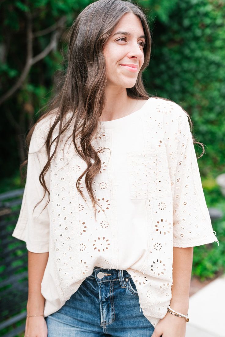 Delicate and timeless, the Keep It Eyelet Short Sleeve Top is the perfect blend of feminine charm and everyday versatility. Featuring intricate eyelet detailing throughout, this top offers a soft, romantic feel while staying comfortable and breathable. The short sleeves and lightweight fabric make it ideal for layering or wearing on its own during warmer days. Pair it with your favorite jeans or skirt for a chic, effortless look that works for any occasion. This top is a must-have for the modern Feminine Spring Top With Cutwork Hem, Feminine Spring Tops With Cutwork Hem, Spring Casual Blouse With Cutwork Hem, Cotton Eyelet Short Sleeve Tops, Summer Short Sleeve Pointelle Knit Tops, Feminine Short Sleeve Eyelet Blouse, Casual Cotton Blouse With Cutwork Hem, Summer Short Sleeve Tops With Broderie Anglaise, Summer Pointelle Knit Short Sleeve Tops