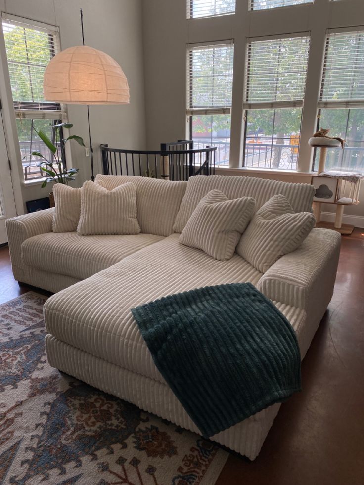 White corduroy sectional couch in loft apartment California home interior design Corduroy Couch Decor, Cordoroy Sofa, Couches Comfy, Minimalist Couch Living Rooms, Comfy Sofas Living Rooms, Caddy Corner Couch In Living Room, Couch Astetic, Couch 2023, Sectional Living Room Modern