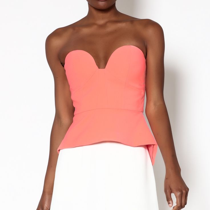 Bright Coral Strapless Bustier Top With A Sweetheart Neckline And Light Padding On Bust. Flared Bottom With Exposed Zipper Closure At The Back. Brand: Minty Meets Munt Fiber Content: 97% Polyester, 3% Spandex Chic Tops With Built-in Bra And Fitted Bodice, Elegant Pink Tops With Built-in Bra, Chic Fitted Bodice Sleeveless Tops, Chic Sleeveless Top With Fitted Bodice, Chic Party Top With Open Neckline, Chic Top With Open Neckline For Parties, Flirty Top For Brunch, Flirty Fitted Top For Brunch, Chic Fitted Bodice Top For Night Out