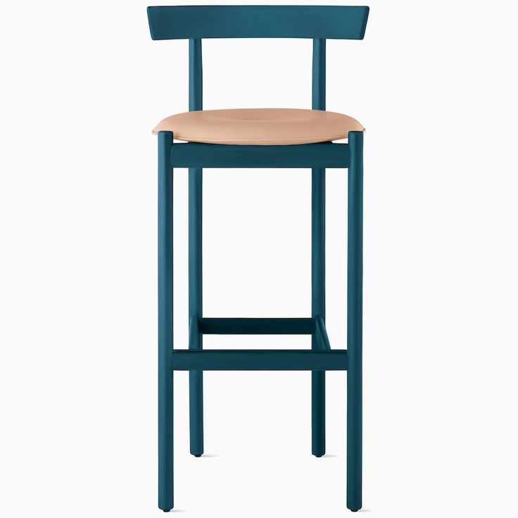 a blue bar stool with a wooden seat and back rest on an isolated white background