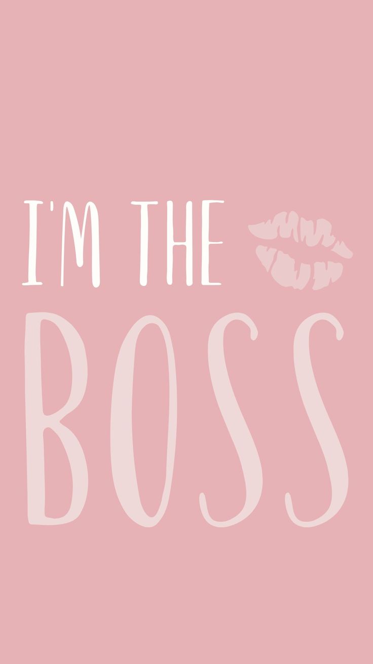 the words i'm the boss are in white letters on a light pink background