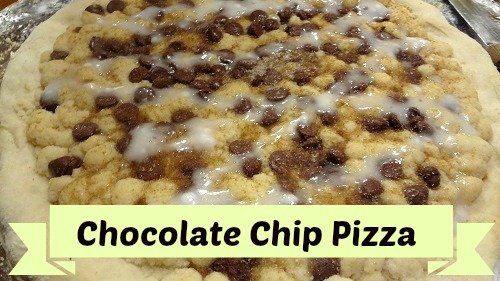 a chocolate chip pizza sitting on top of a pan